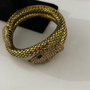Gold mesh serpent coiled bracelet with rhinestone. Good condition